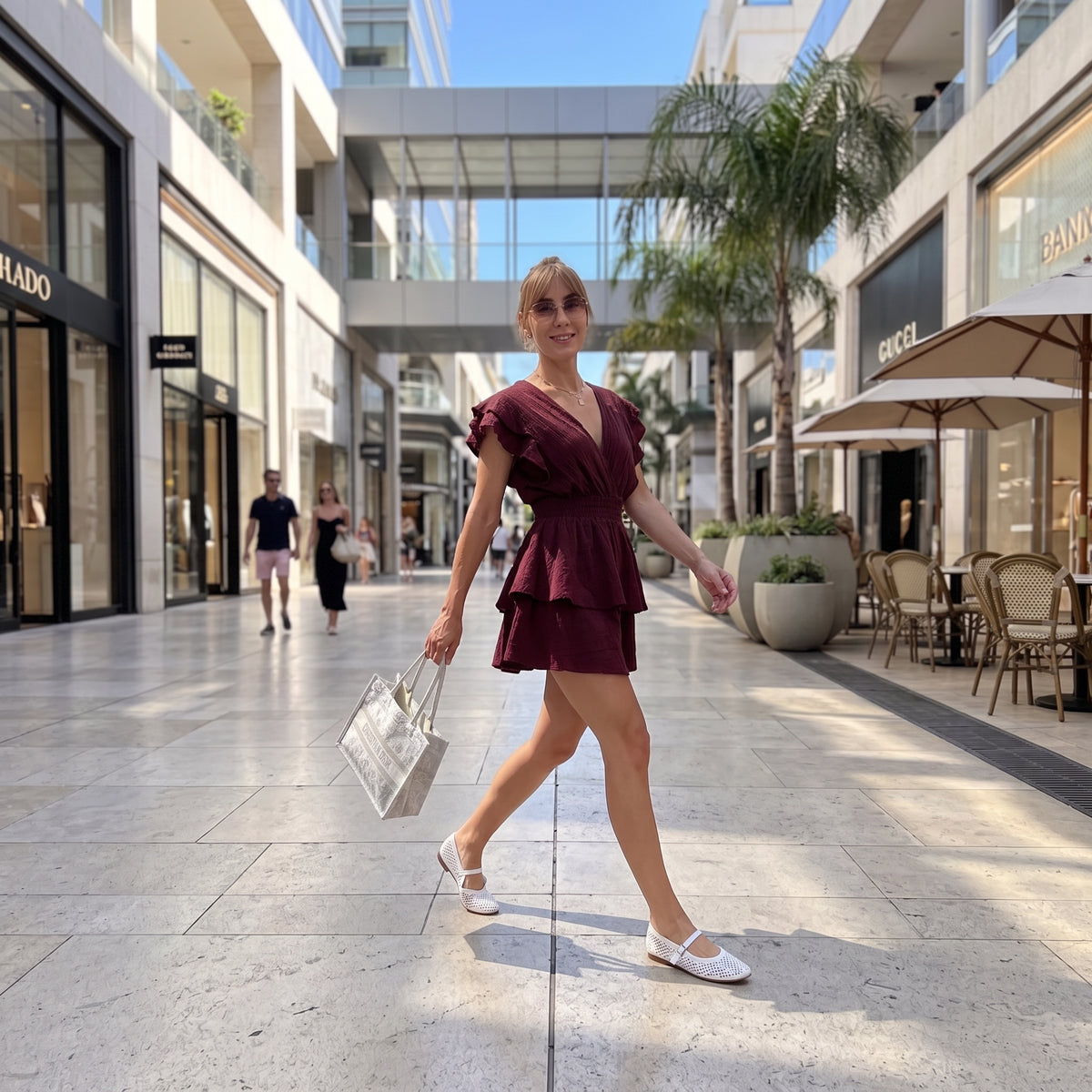 Merlot Ruffle Romper Dress - lifestyle view | women's ruffle romper dress resort wear | Vleyn